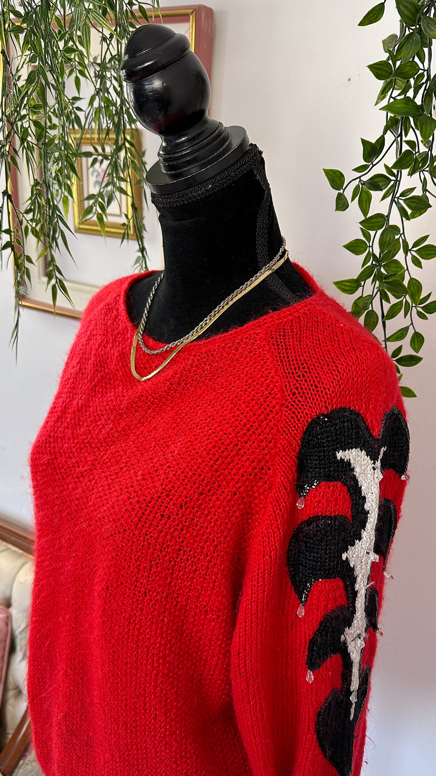 Red knit sweater with sequins on the sleeves - large