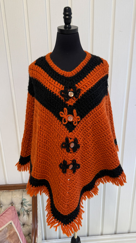 Chandail/poncho tricot orange et noir- medium