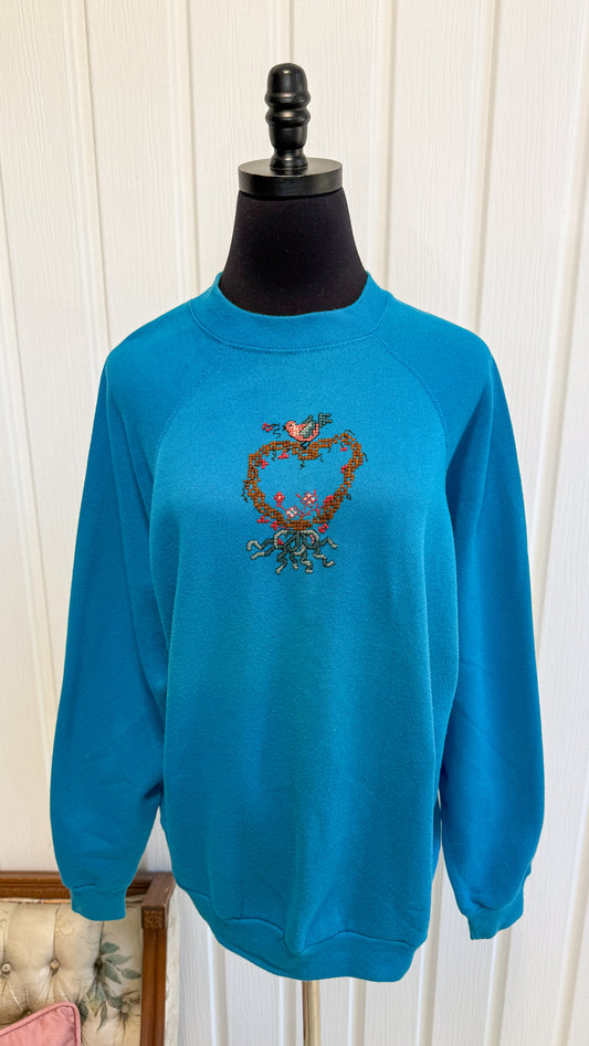 Chandail crewneck bleu couronne et oiseau- large