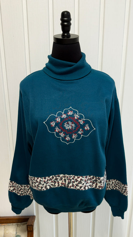 Chandail col roulé turquoise fleuris- small